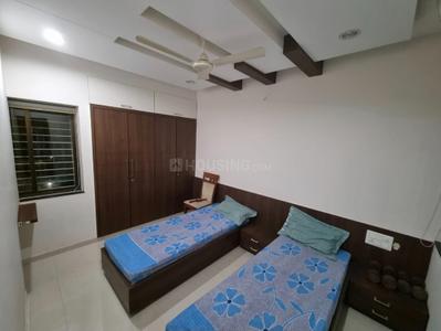 Bedroom Image of 1200 Sq.ft 3 BHK Apartment / Flat for rent in Ghanshyam Nagar Rajkot for Rs. 35000
