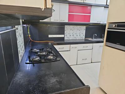 Kitchen Image of 950 Sq.ft 2 BHK Apartment / Flat for rent in Ajmera Bhakti Park, Wadala East Mumbai for Rs. 72000
