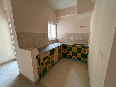 Kitchen Image of 920 Sq.ft 2.5 BHK Apartment / Flat for sale in Amrapali Dream Valley 2, Noida Extension Greater Noida for Rs. 6860000