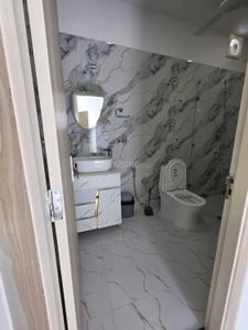 Bathroom Image of 550 Sq.ft 1 RK Builder Floor for rent in DLF Capital Greens Phase III, Karampura New Delhi for Rs. 23500