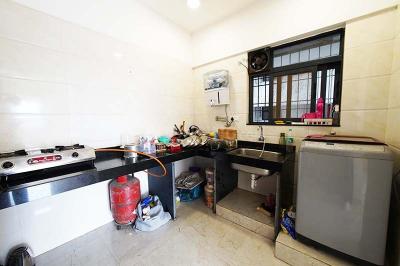 Kitchen Image of 950 Sq.ft 2 BHK Apartment / Flat for sale in Tathawade Pune for Rs. 8500000