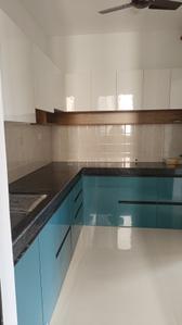 Kitchen Image of 1024 Sq.ft 2 BHK Apartment / Flat for rent in Shapoorji Pallonji Joyville Sensorium, Maan Pune for Rs. 26000