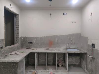 Kitchen Image of 900 Sq.ft 3 BHK Apartment / Flat for sale in Fairdeal Burari Dream Homes, Burari New Delhi for Rs. 4800000