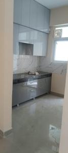 Kitchen Image of 940 Sq.ft 2 BHK Apartment / Flat for rent in Sikka Karnam Greens, Sector 143B Noida for Rs. 27000