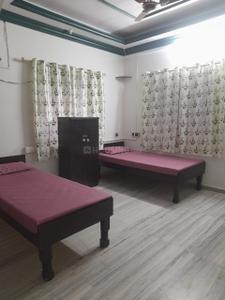 Bedroom Image of Vishal Pg baroda  in Fatehgunj, Vadodara