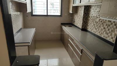 Kitchen Image of 1200 Sq.ft 3 BHK Apartment / Flat for sale in Charms Paradise C Wing, Titwala Thane for Rs. 5200000