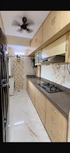 Kitchen Image of 1266 Sq.ft 2 BHK Apartment / Flat for sale in Poddar Shri Ganesh Apartments, Goregaon West Mumbai for Rs. 32500000