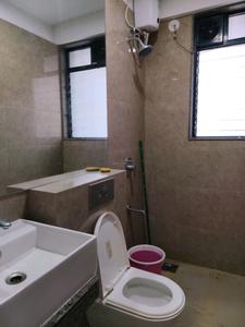 Common Bathroom Image of 694 Sq.ft 2 BHK Apartment / Flat for sale in Sunteck City Avenue 2, Goregaon West Mumbai for Rs. 17500000