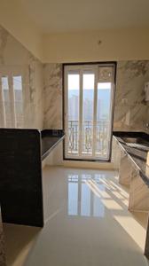 Kitchen Image of 1030 Sq.ft 2 BHK Apartment / Flat for sale in Paradise Sai World Empire Phase 1, Kharghar Navi Mumbai for Rs. 18000000