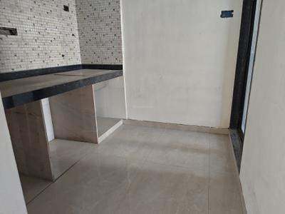 Kitchen Image of 680 Sq.ft 1 BHK Apartment / Flat for sale in Nanak Joy Aura, Ulwe Navi Mumbai for Rs. 4700000