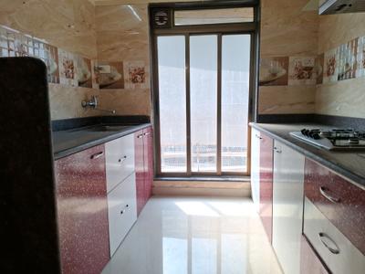 Kitchen Image of 1050 Sq.ft 2 BHK Apartment / Flat for rent in Manas Krishna Dhan, Kamothe Navi Mumbai for Rs. 32000