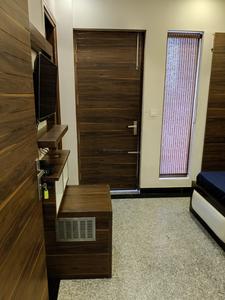 Bedroom Image of Aurikan Rooms in Sector 42, Gurgaon