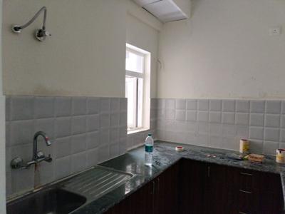 Kitchen Image of 1000 Sq.ft 2 BHK Apartment / Flat for sale in Amrapali Verona Heights, Noida Extension Greater Noida for Rs. 7200000