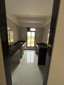 Kitchen Image of 650 Sq.ft 1 BHK Apartment / Flat for sale in Tharwani Vedant Millenia, Titwala Thane for Rs. 2700000