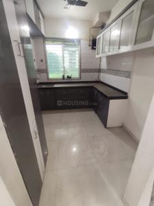 Kitchen Image of 850 Sq.ft 2 BHK Apartment / Flat for sale in Manohar Shreeji Nirvana II, Badlapur East Badlapur for Rs. 4000000