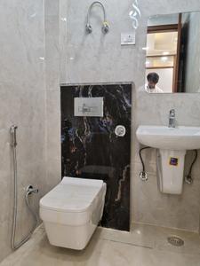 Common Bathroom Image of 550 Sq.ft 2 BHK Apartment / Flat for sale in Dwarka Mor New Delhi for Rs. 3750001