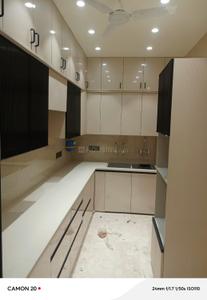 Kitchen Image of 1350 Sq.ft 3 BHK Builder Floor for rent in Kirti Nagar New Delhi for Rs. 70000