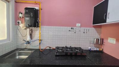 Kitchen Image of 1000 Sq.ft 1 BHK Apartment / Flat for sale in Applewoods Satyesh Residency, Shela Ahmedabad for Rs. 2900000