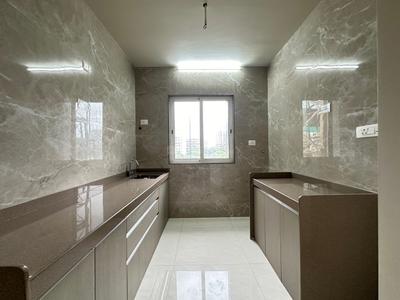 Kitchen Image of 722 Sq.ft 1 BHK Apartment / Flat for sale in Thakurli Thane for Rs. 5415000