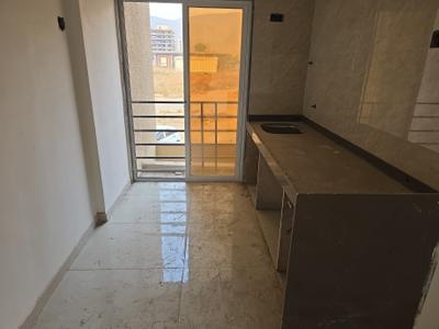 Kitchen Image of 710 Sq.ft 1 BHK Apartment / Flat for sale in Pushpak Nagar Navi Mumbai for Rs. 4100000