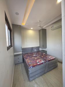Bedroom Image of 600 Sq.ft 1 BHK Builder Floor for rent in Rajouri Garden New Delhi for Rs. 21000