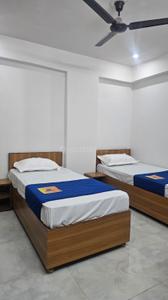 Bedroom Image of Shyam Vandana Boys PG in Sector 16A, Noida