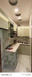 Kitchen Image of 545 Sq.ft 2 BHK Builder Floor for rent in Mansa Ram Park New Delhi for Rs. 16000