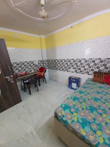 Bedroom Image of 320 Sq.ft 1 BHK Builder Floor for rent in Ranjeet Nagar New Delhi for Rs. 14000