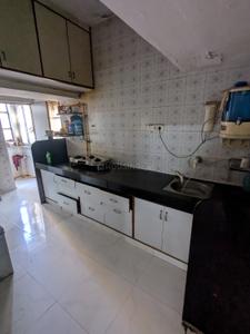 Kitchen Image of 990 Sq.ft 1.5 BHK Apartment / Flat for rent in Pratiksha Apartment, Naranpura Ahmedabad for Rs. 28000
