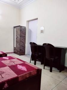 Bedroom Image of Chitra Girls and Boys PG in Sector 41, Noida