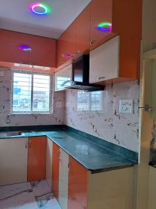 Kitchen Image of 1020 Sq.ft 2 BHK Apartment / Flat for sale in Baguiati Kolkata for Rs. 4700000
