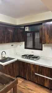 Kitchen Image of 900 Sq.ft 2 BHK Apartment / Flat for rent in Sector 3A Gurgaon for Rs. 25000
