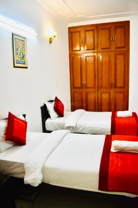 Bedroom Image of Madhuraj Hotels in Sector 51, Noida