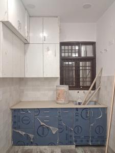 Kitchen Image of 560 Sq.ft 2 BHK Builder Floor for rent in Aman Floors, Sector 24 Rohini New Delhi for Rs. 18000