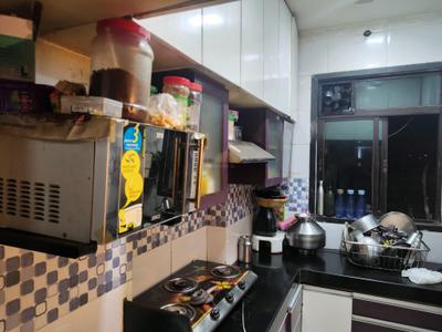 Kitchen Image of 700 Sq.ft 1 BHK Apartment / Flat for rent in Puraniks City Reserva Phase 1, Kasarvadavali Thane for Rs. 16000