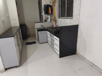 Kitchen Image of 850 Sq.ft 1 BHK Apartment / Flat for rent in Sargasan Gandhinagar for Rs. 20000