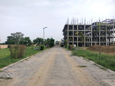 Image of 150 Sq.ft Residential Plot / Land for sale in Adore Smart City 2, Tajupur, Faridabad for Rs. 18900000