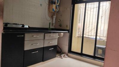 Kitchen Image of 680 Sq.ft 1 BHK Apartment / Flat for rent in Platinum Silver Classic, Kalamboli Navi Mumbai for Rs. 20000