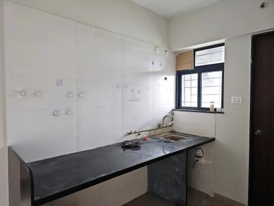 Kitchen Image of 950 Sq.ft 2 BHK Apartment / Flat for sale in Dheeraj Jade Residences , Wagholi Pune for Rs. 7150000
