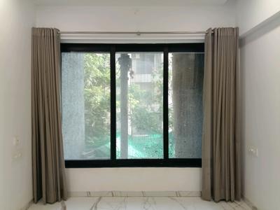 Living Room Image of 710 Sq.ft 1 BHK Apartment / Flat for sale in Raj 127 Raj Homes, Mira Road East Mira Bhayandar for Rs. 7800000
