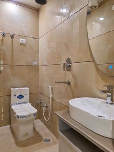 Common Bathroom Image of 1200 Sq.ft 4 BHK Apartment / Flat for sale in Hastsal New Delhi for Rs. 7700000