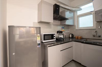 Kitchen Image of 550 Sq.ft 1 BHK Builder Floor for rent in Chhattarpur New Delhi for Rs. 27999