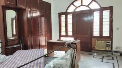 Bedroom Image of 1500 Sq.ft 2 BHK Builder Floor for rent in Shivalik New Delhi for Rs. 60000