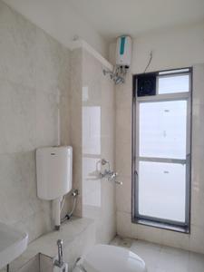 Common Bathroom Image of 700 Sq.ft 1 BHK Apartment / Flat for rent in Rosa Elite, Thane West Thane for Rs. 15000