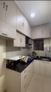 Kitchen Image of 1200 Sq.ft 2 BHK Apartment / Flat for rent in Shrachi Greenwood Nest, New Town Kolkata for Rs. 34000