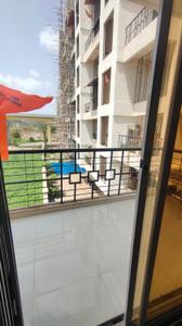 Balcony Image of 650 Sq.ft 1 BHK Apartment / Flat for sale in Charms City A12, Titwala Thane for Rs. 3400000
