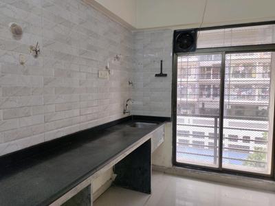 Kitchen Image of 700 Sq.ft 1 BHK Apartment / Flat for sale in Moraj Prive, Kopar Khairane Navi Mumbai for Rs. 12000000
