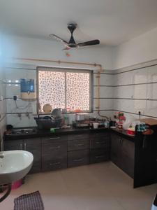 Kitchen Image of 1075 Sq.ft 2 BHK Apartment / Flat for sale in Anjani Enclave, Variav Surat for Rs. 3600000