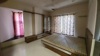 Bedroom Image of 1150 Sq.ft 2 BHK Apartment / Flat for rent in Pankaj Aasmaan, Lohegaon Pune for Rs. 24000