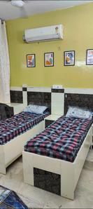 Bedroom Image of Pg in Lajpat Nagar, New Delhi